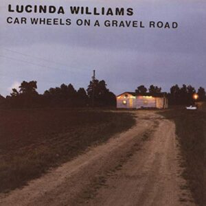 CAR WHEELS ON A GRAVEL ROAD (CD)